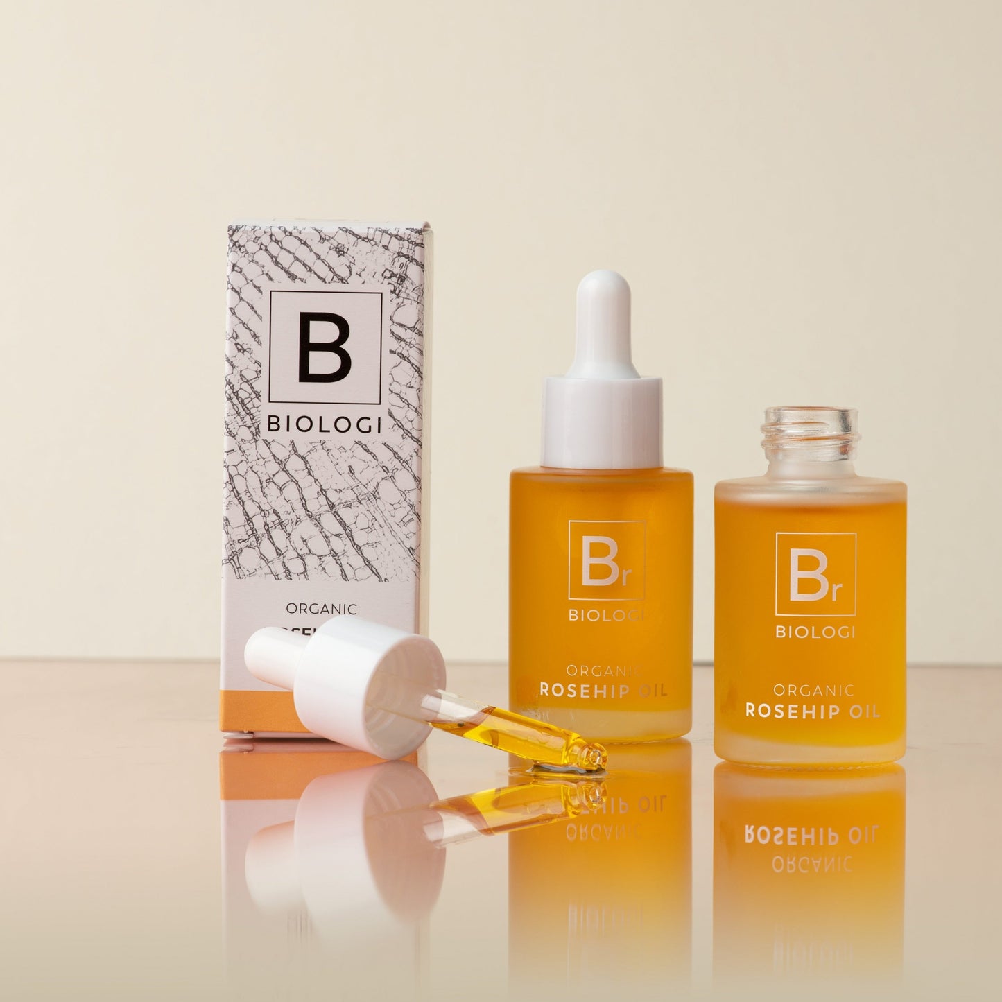 Biologi Br Rosehip Oil two bottles of product with packaging- Margot body